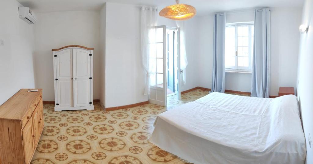 Ένα ή περισσότερα κρεβάτια σε δωμάτιο στο Villa Bianca