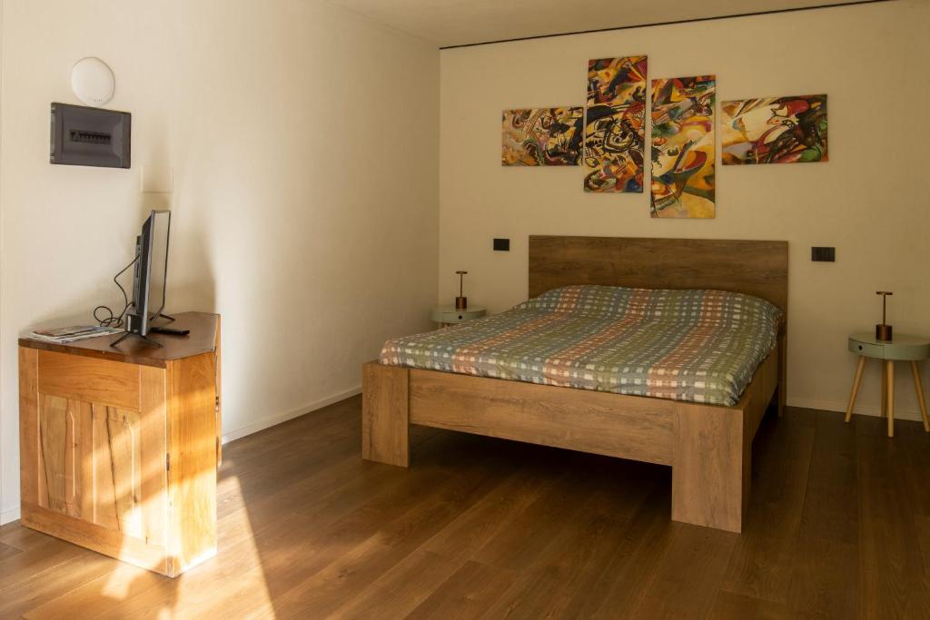 Postel nebo postele na pokoji v ubytování Little Paradise - Ampio Monolocale