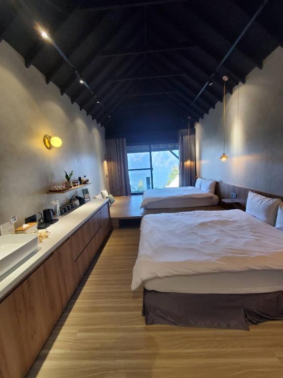 Postel nebo postele na pokoji v ubytování Zu Sin Garden B&B