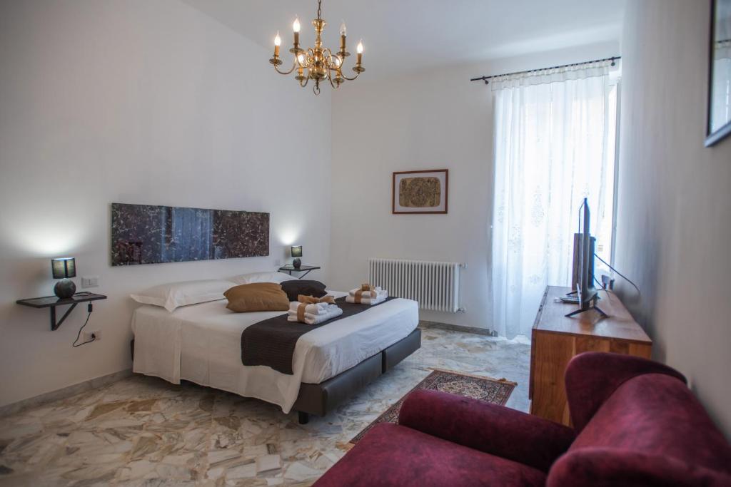 A bed or beds in a room at B&B Don Alessandro