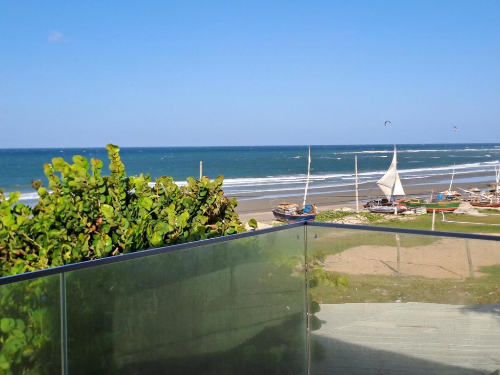 a view of the beach from the roof of a building at Vista Mar Emboaca in Estrela