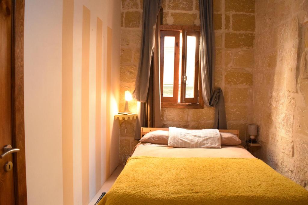 Postel nebo postele na pokoji v ubytování St George of Lydda B&B