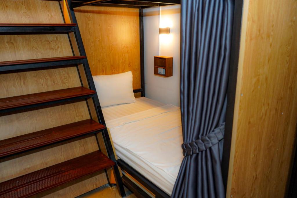 Postel nebo postele na pokoji v ubytování Bliss & Beats Hostel