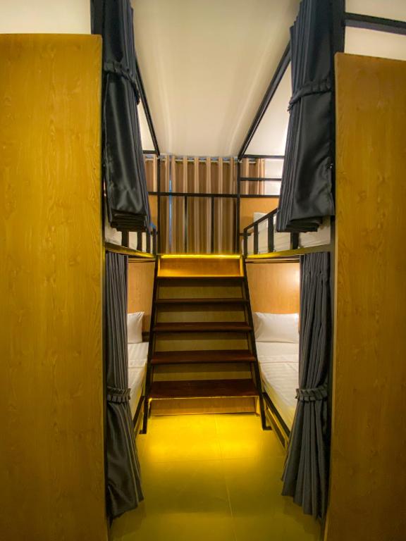 Postel nebo postele na pokoji v ubytování Bliss & Beats Hostel
