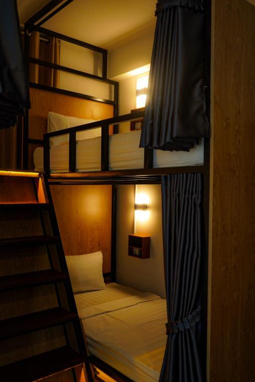 Postel nebo postele na pokoji v ubytování Bliss & Beats Hostel