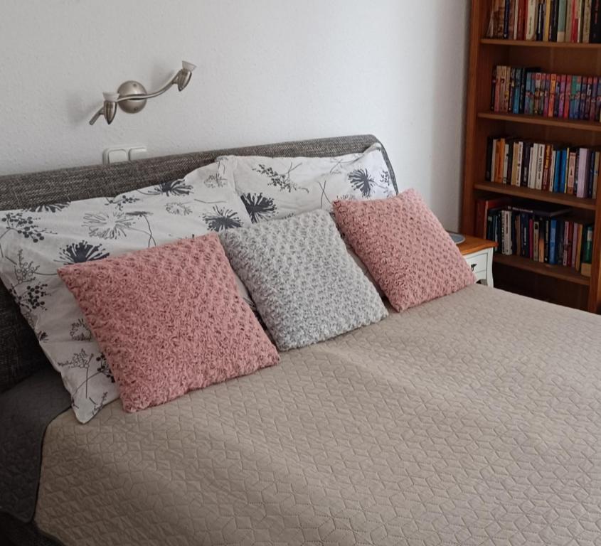 Postel nebo postele na pokoji v ubytování Veronica Apartman