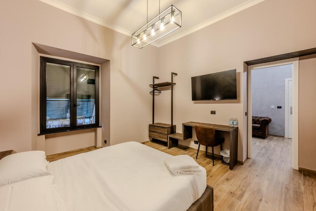 Postel nebo postele na pokoji v ubytování Soziglia Guest Rooms