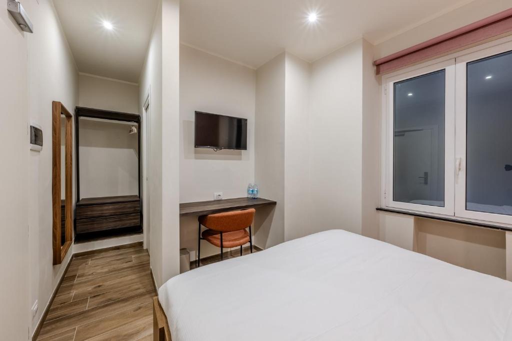 Postel nebo postele na pokoji v ubytování Soziglia Guest Rooms