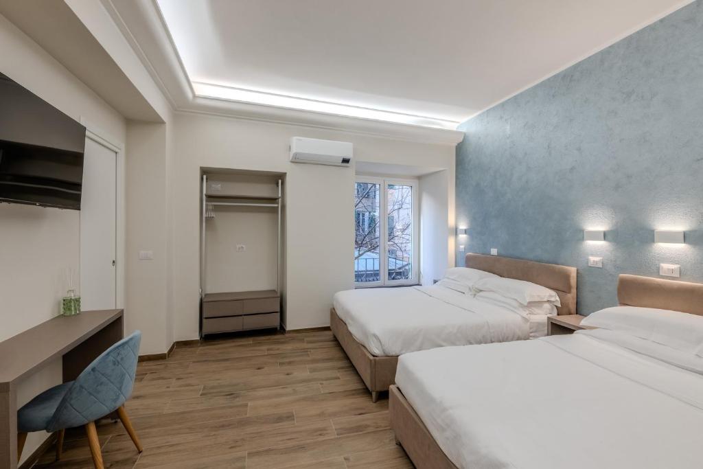 Postel nebo postele na pokoji v ubytování Soziglia Guest Rooms