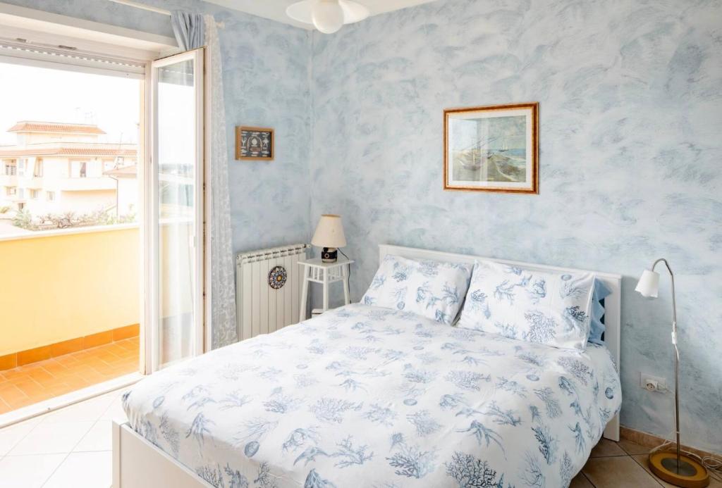 Postel nebo postele na pokoji v ubytování Casa di Sandra