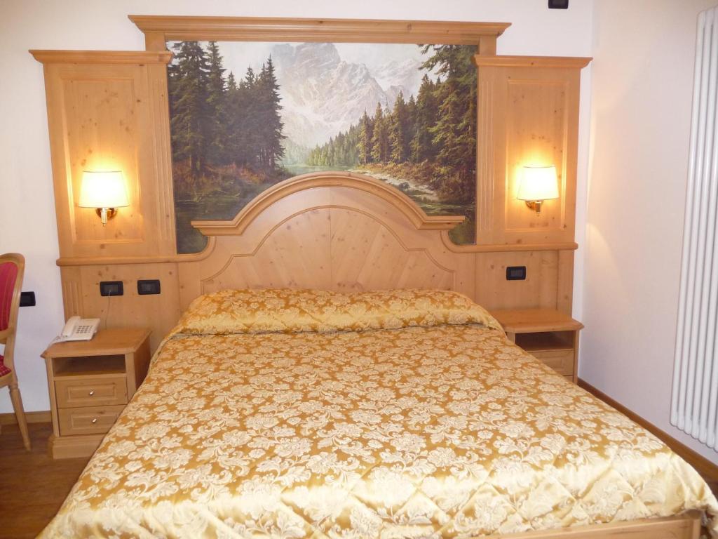 Postel nebo postele na pokoji v ubytování Hotel Almazzago