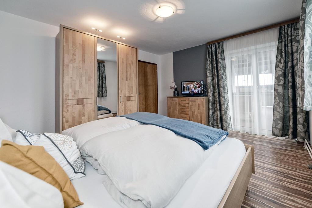 Postel nebo postele na pokoji v ubytování Genuss.Haus.Fankhauser