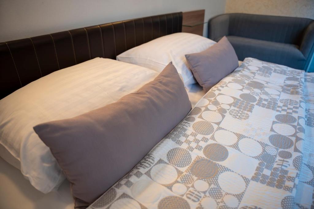 Postel nebo postele na pokoji v ubytování B&B Brezov Gaj