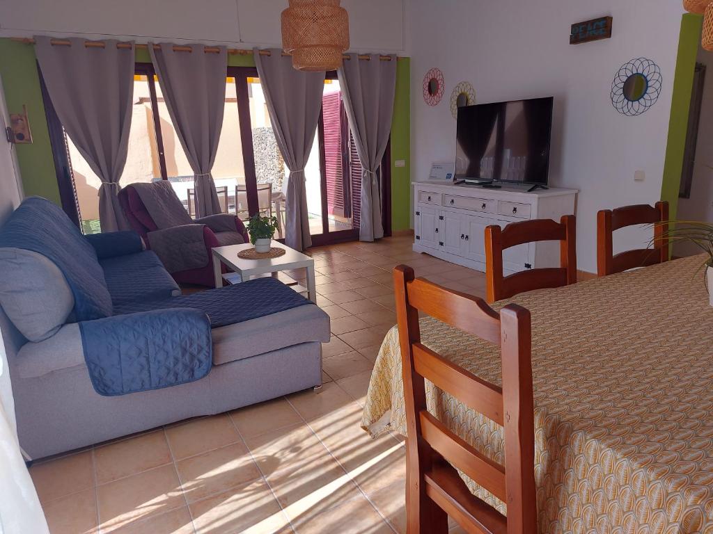 TV a/nebo společenská místnost v ubytování villa Mimosa
