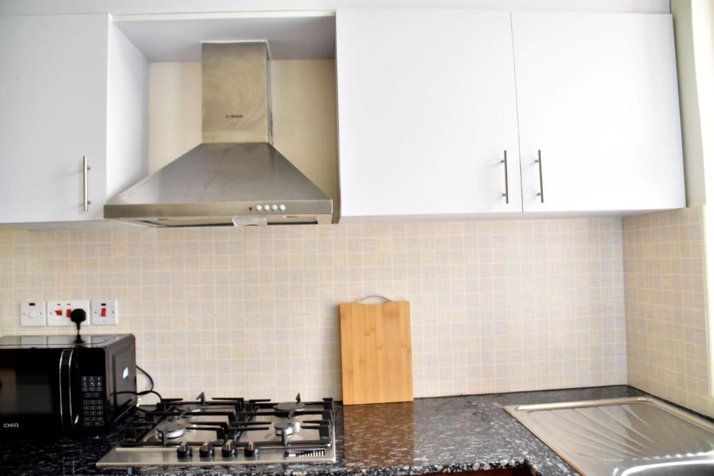 Kuchyň nebo kuchyňský kout v ubytování Miles' place