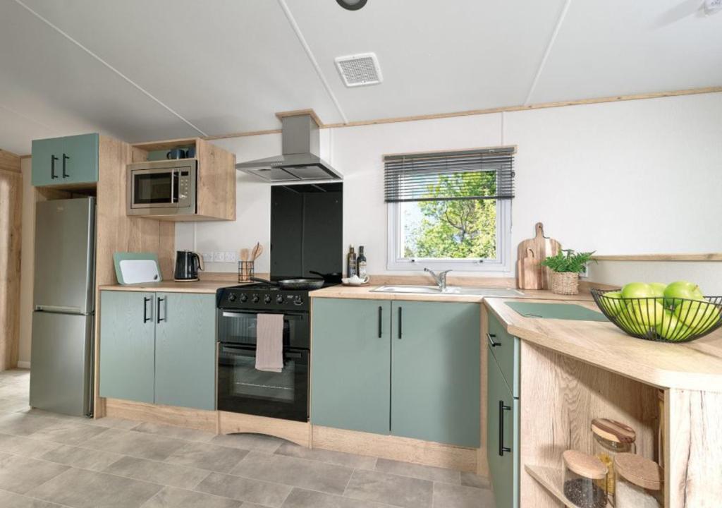 Coed Helen Holiday Park - Caravane