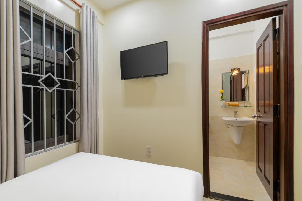 TV a/nebo společenská místnost v ubytování Sun Moon Riverside Hoi An