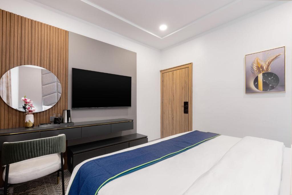 Μια τηλεόραση ή/και κέντρο ψυχαγωγίας στο STP Apartments