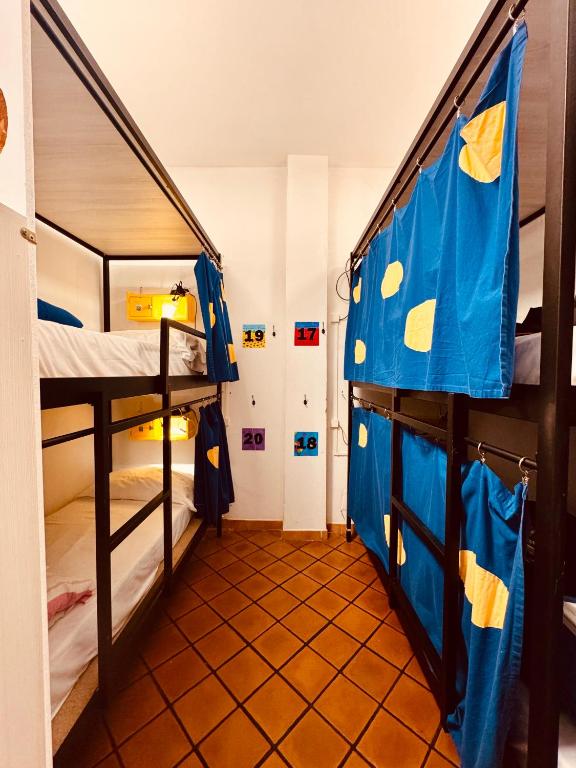 Postel nebo postele na pokoji v ubytování Hostel Il Nosadillo - Bologna