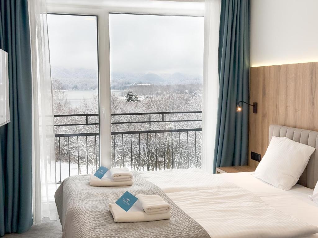 Postel nebo postele na pokoji v ubytování Solina Resort