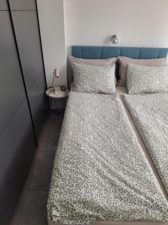 Postel nebo postele na pokoji v ubytování Apartman u Zemunu