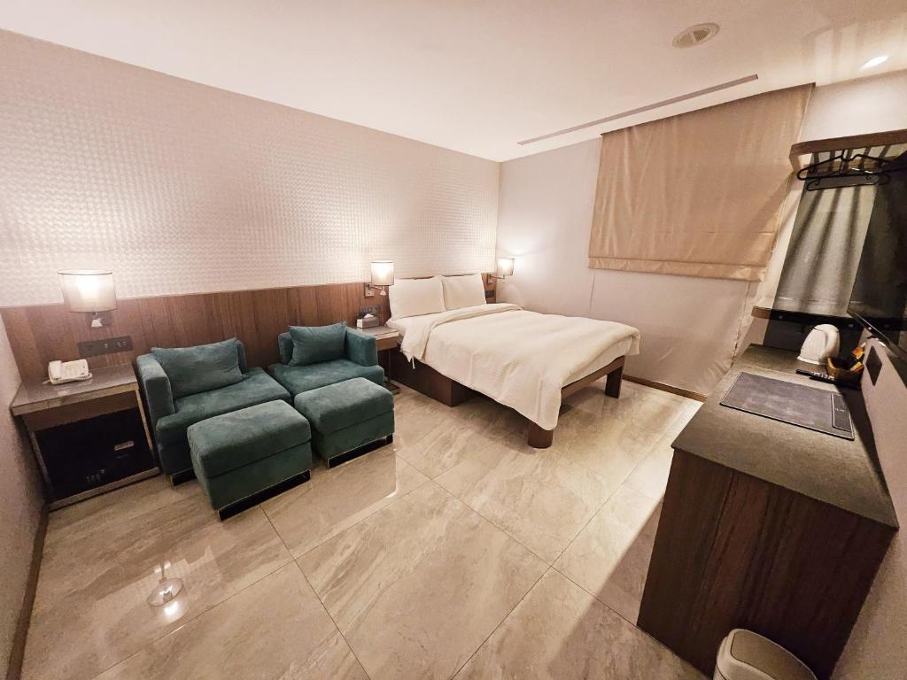Postel nebo postele na pokoji v ubytování Beauty Hotels Taipei - B7 Journey