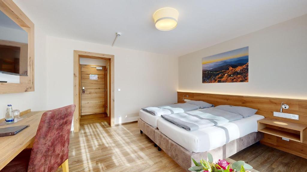 Postel nebo postele na pokoji v ubytování Hotel Friedenseiche