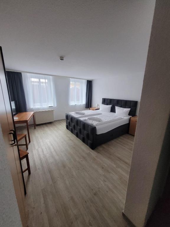 Postel nebo postele na pokoji v ubytování Appartement-Hotel Rostock