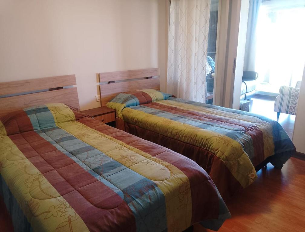 Postel nebo postele na pokoji v ubytování Cabaña familiar