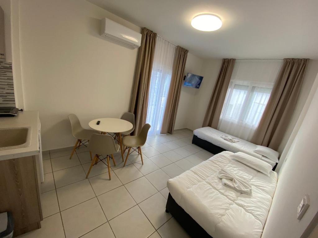 Postel nebo postele na pokoji v ubytování Sunny Beach Potos