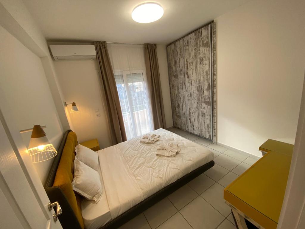 Postel nebo postele na pokoji v ubytování Sunny Beach Potos