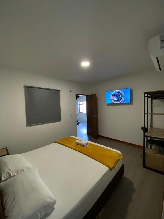 Postel nebo postele na pokoji v ubytování Hotel Gallery By 70