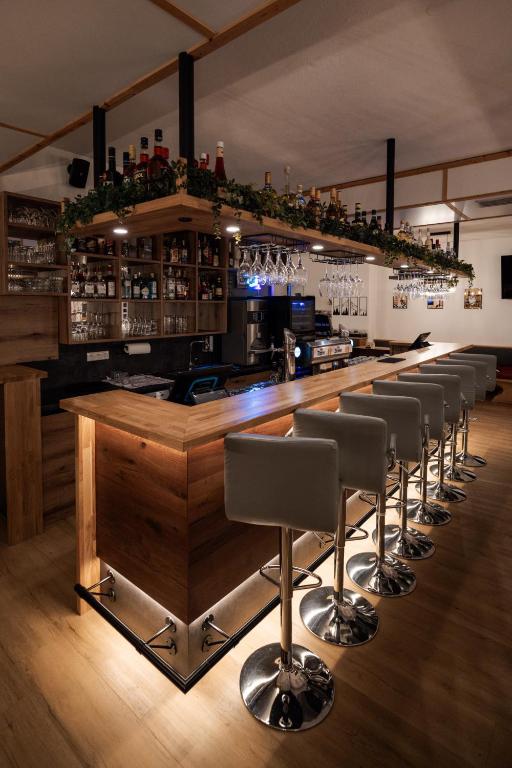 Lounge nebo bar v ubytování Hotel Tauernglöckl