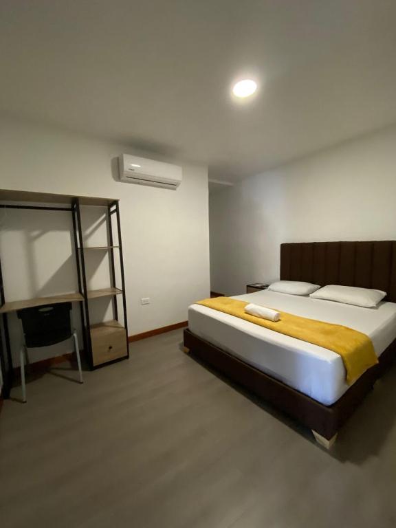 Postel nebo postele na pokoji v ubytování Hotel Gallery By 70