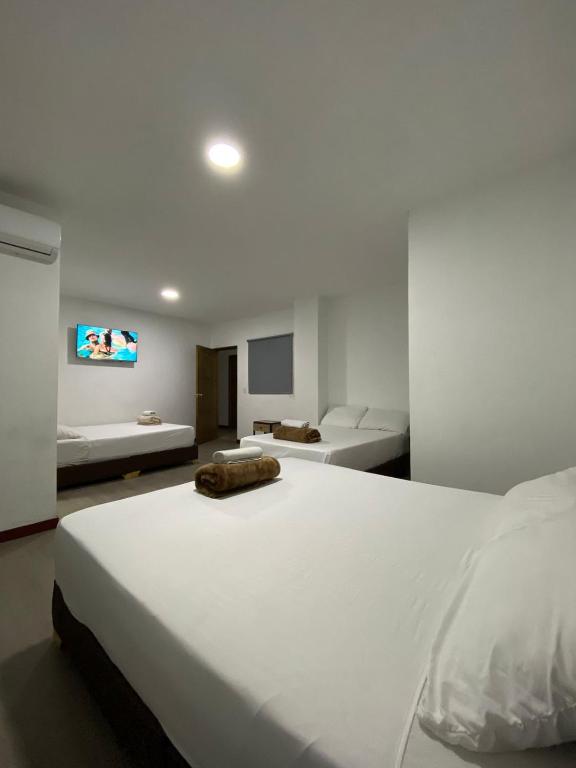 Postel nebo postele na pokoji v ubytování Hotel Gallery By 70