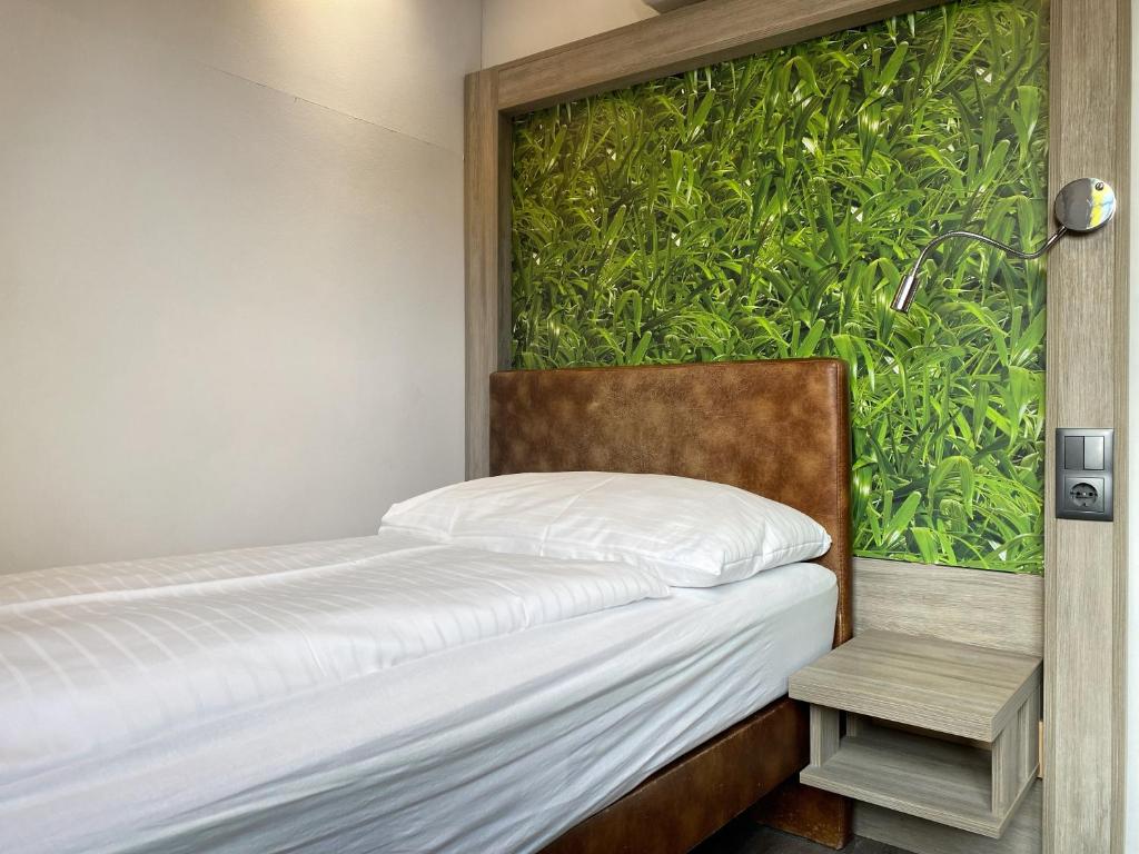 Posteľ alebo postele v izbe v ubytovaní Smart Hotel Schönbrunn