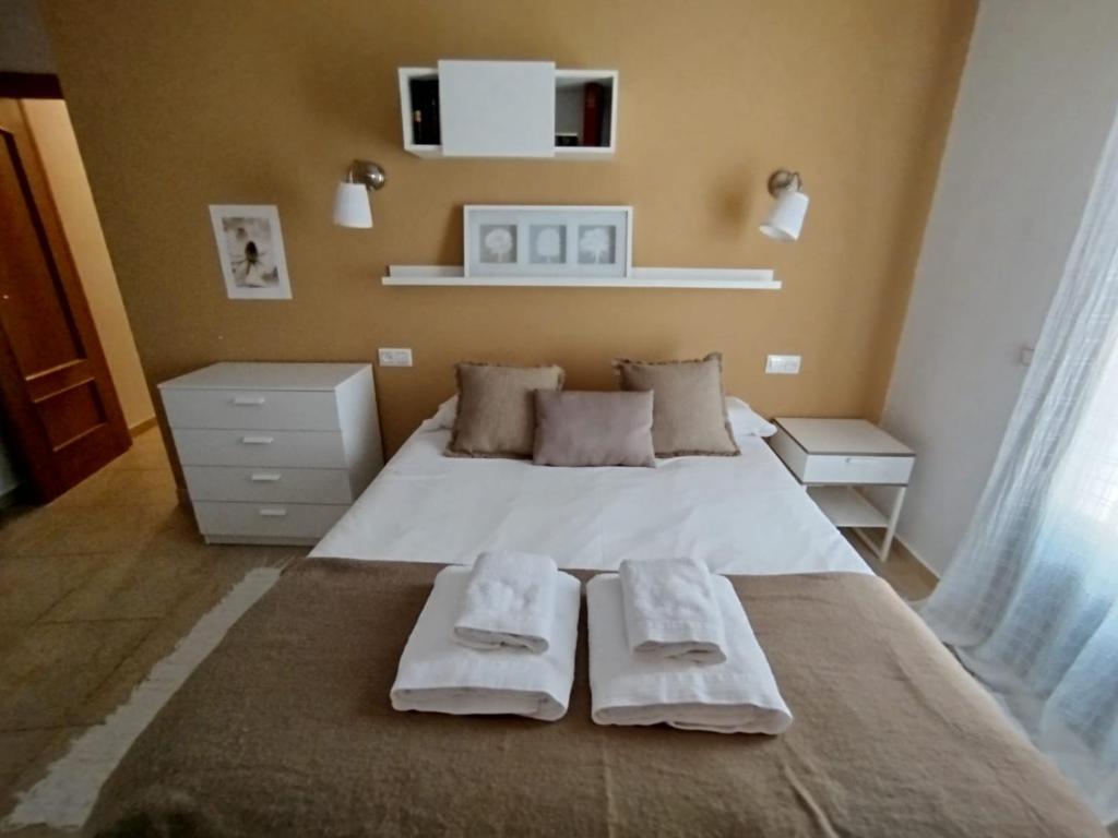 Posteľ alebo postele v izbe v ubytovaní Vivienda Tremedal