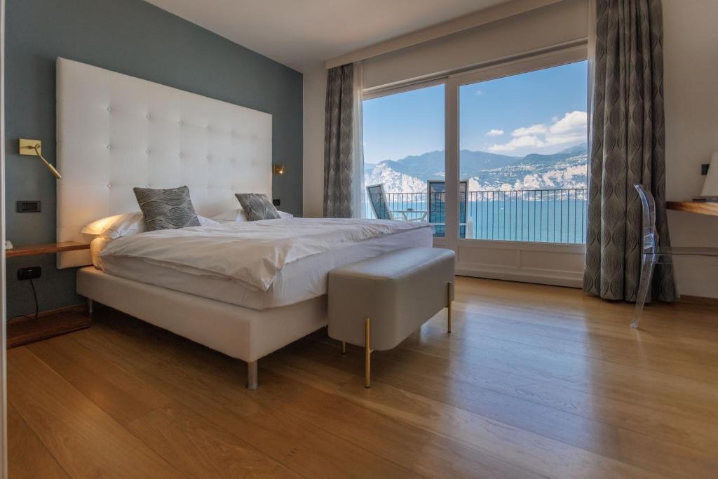 Postel nebo postele na pokoji v ubytování Hotel Capri