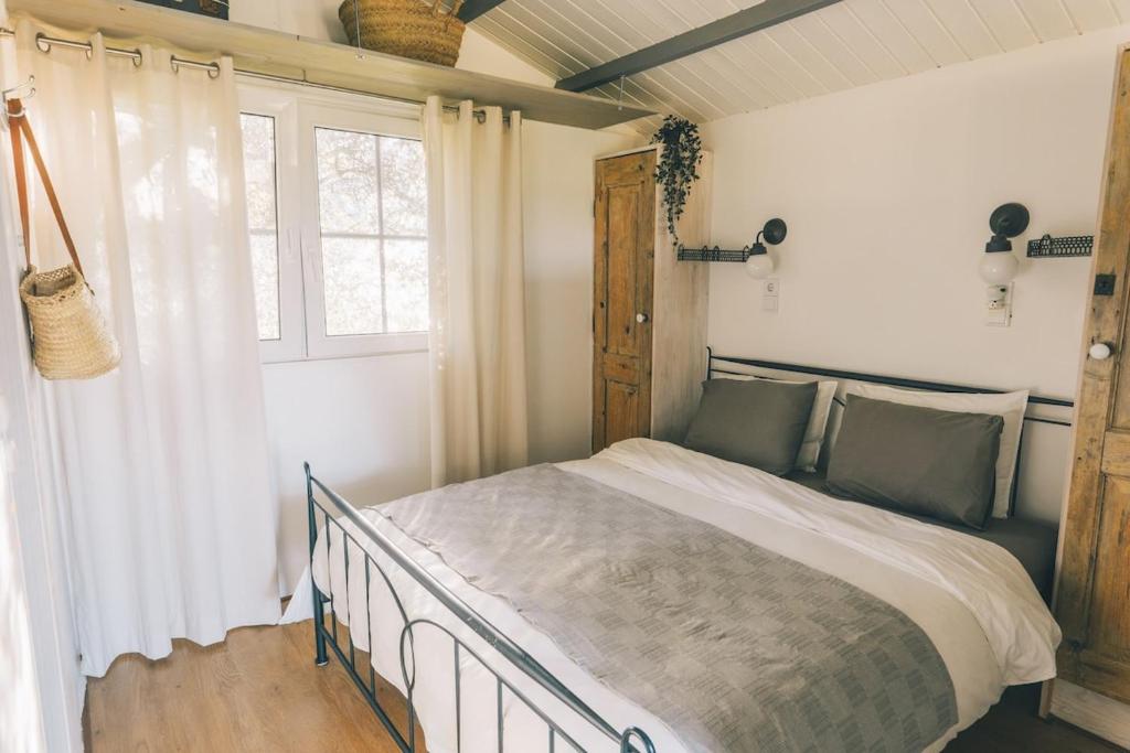 Postel nebo postele na pokoji v ubytování Quinta Bohemia