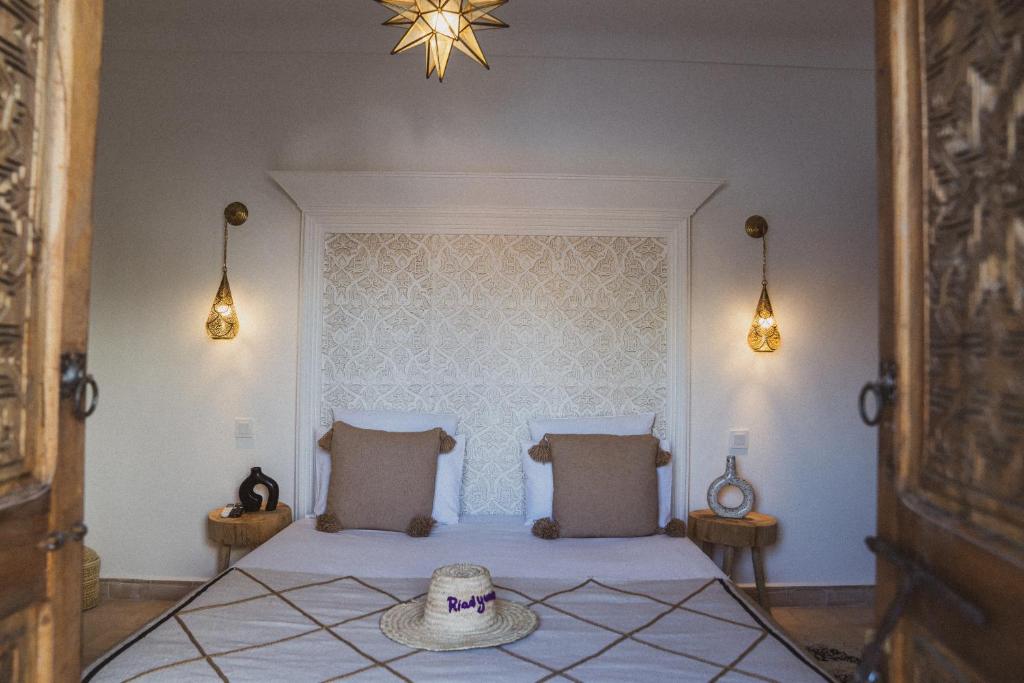 Postel nebo postele na pokoji v ubytování Riad Yuna