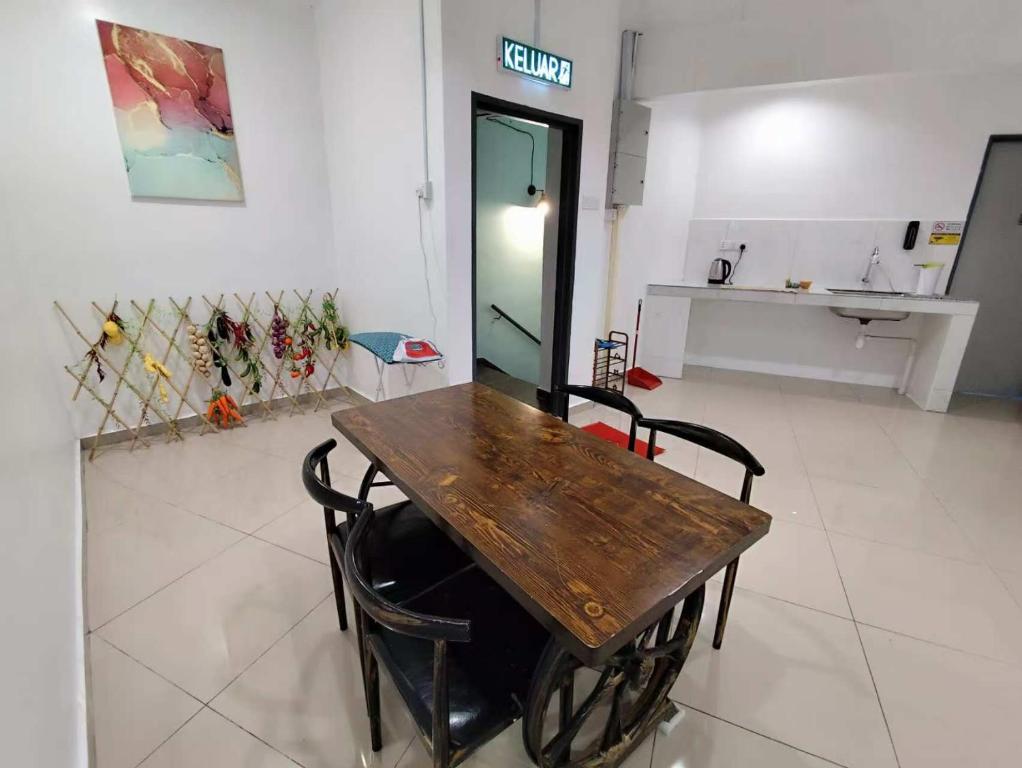Kuchyň nebo kuchyňský kout v ubytování MUSANG ONG HOTEL