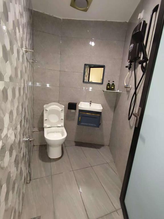 Koupelna v ubytování MUSANG ONG HOTEL