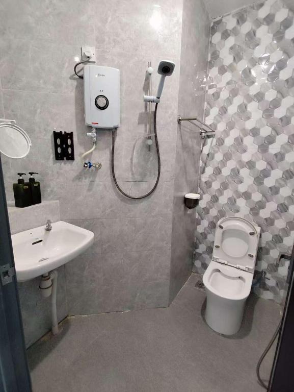 Koupelna v ubytování MUSANG ONG HOTEL