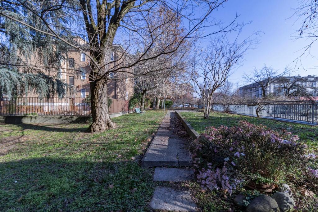 Um jardim no exterior de Casa Carozzi