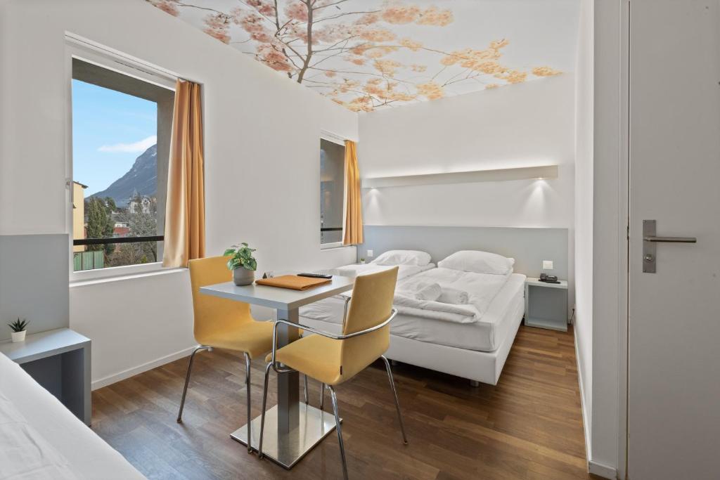 Posezení v ubytování Hôtel de la Poste Sierre