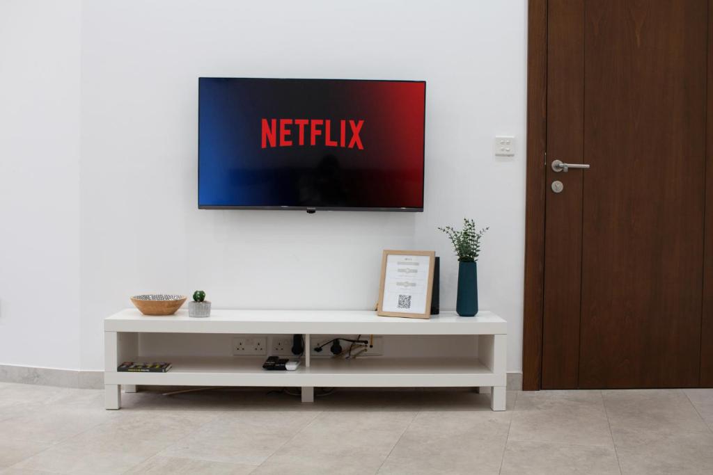 TV a/nebo společenská místnost v ubytování Sandstone Apartment 19