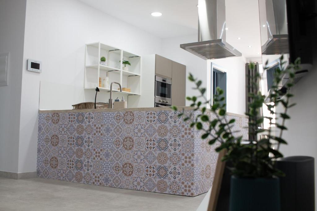 Kuchyň nebo kuchyňský kout v ubytování Sandstone Apartment 19