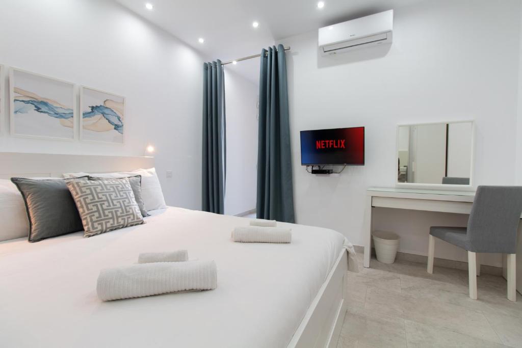 Postel nebo postele na pokoji v ubytování Sandstone Apartment 19