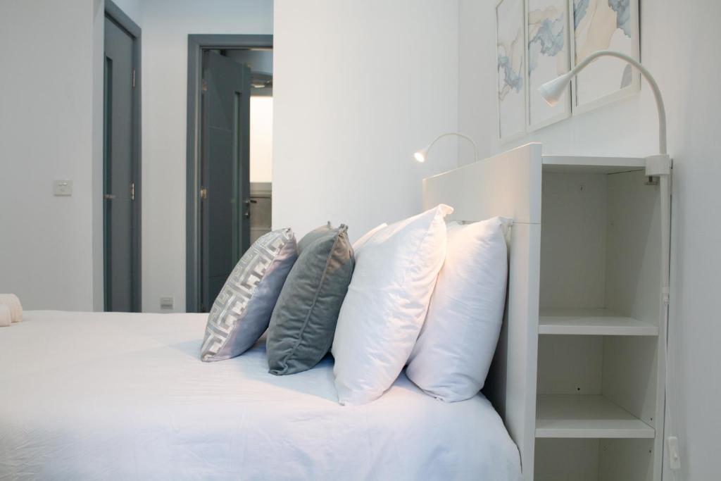 Postel nebo postele na pokoji v ubytování Sandstone Apartment 19
