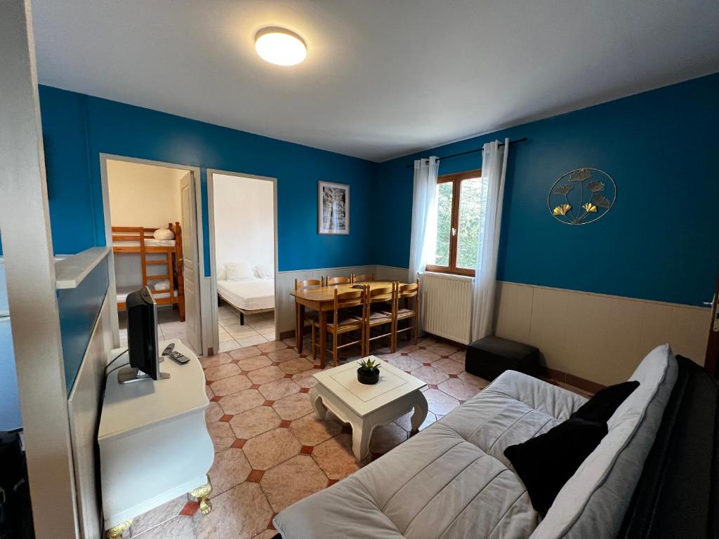 Postel nebo postele na pokoji v ubytování Camping de la Lyre